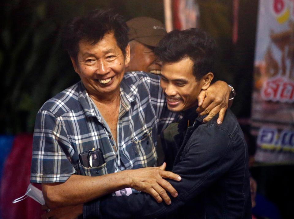 Two dads hug each other in utter relief after they receive the good news