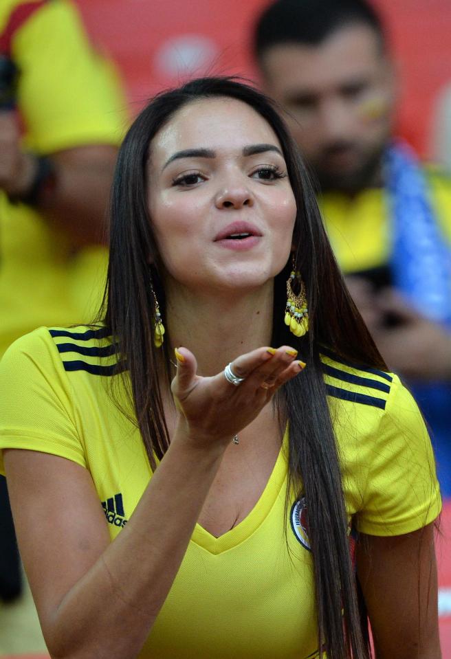 A Colombia fan blows a kiss during last-16 clash against England