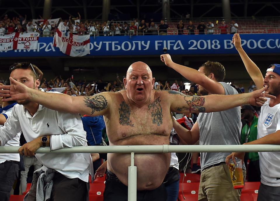  An England fan in Moscow celebrates the win