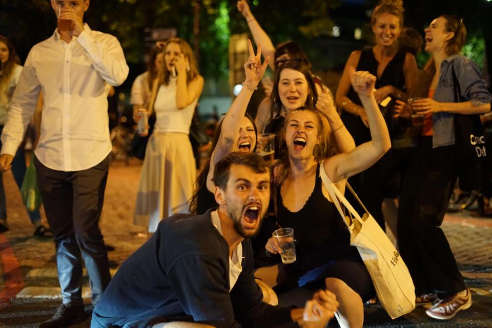  Fans celebrate the win in Kennington last night