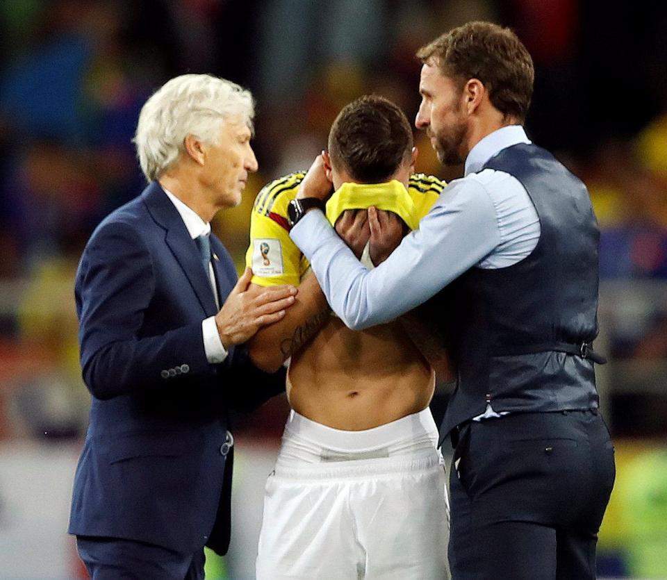  Gareth Southgate took time to comfort Mateus Uribe, one of the two Colombian players who had missed their penalty