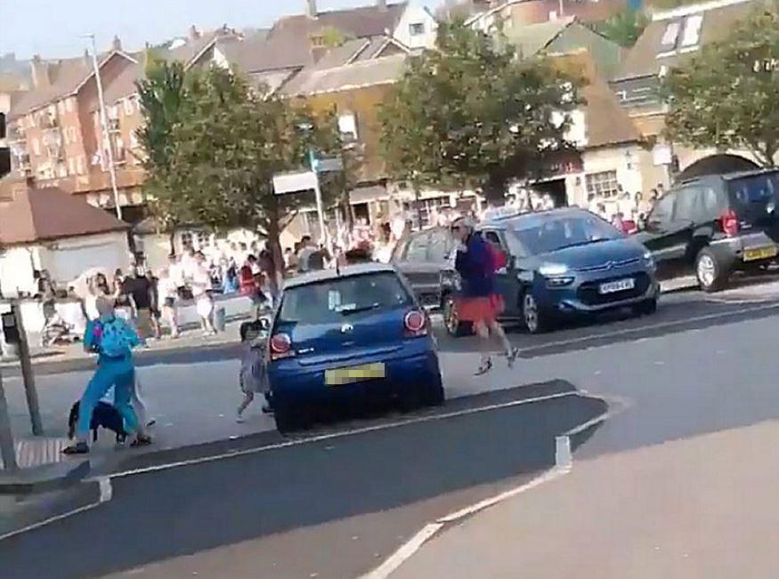  Apparently the car narrowly avoided a family who were cross the road