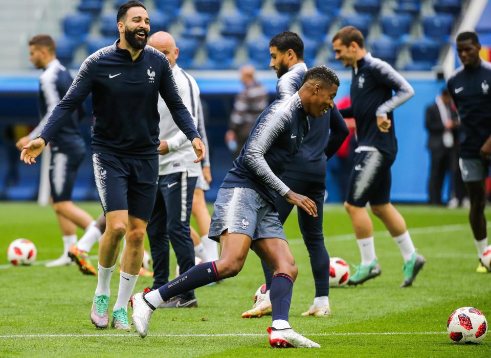 France duo Adil Rami and Presnel Kimpembe enjoy training on the eve of the clash with Belgium