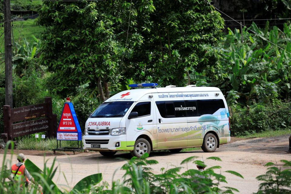  An ambulance leaves the cave site on the final day of the rescue operation