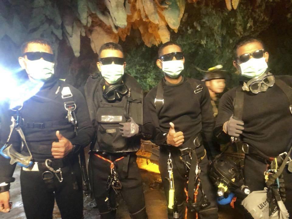 The last four Thai navy seals are pictured after escaping the cave safely