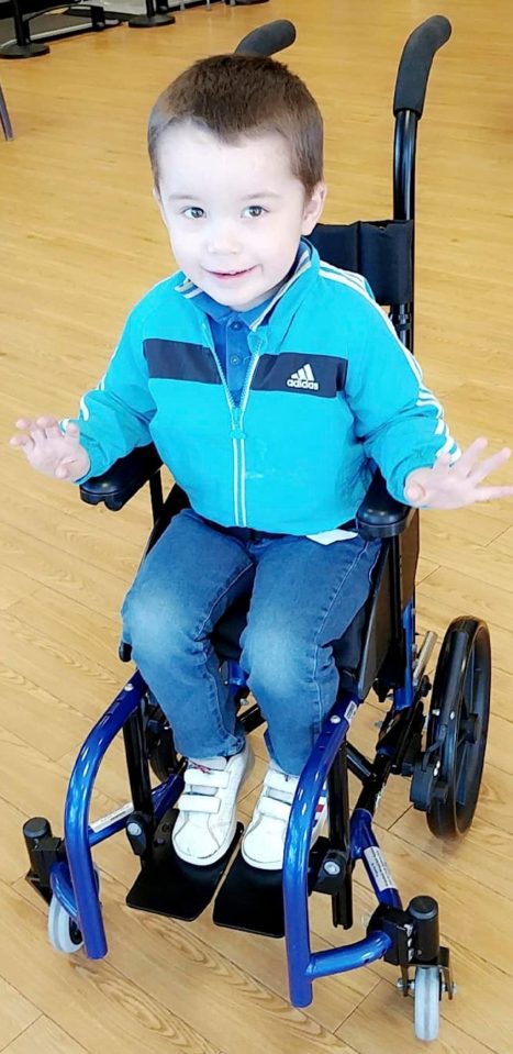  Alfie suffers from Perthes disease which causes the femur bones that meet his hips to crumble leaving him to sometimes use a wheelchair on long distances