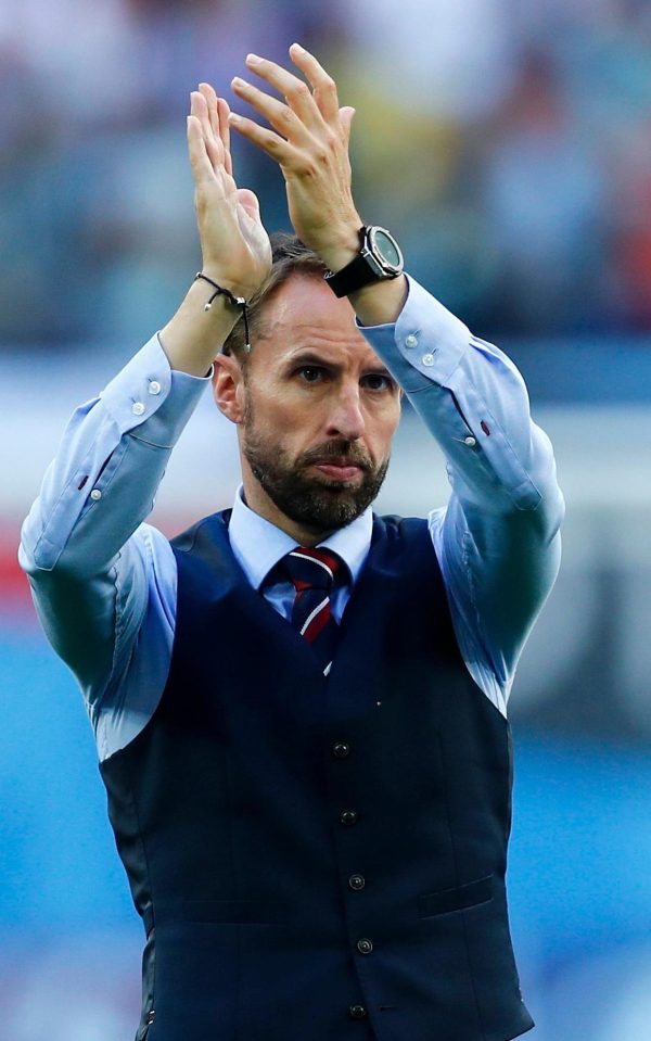  Gareth Southgate with his dapper shirt, tie and waistcoat combo, is as suave as a suburban James Bond