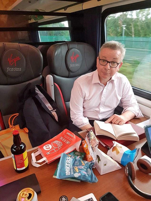  Michael Gove, also caught up in the delays, offered wine to other passengers who had been bumped up to first class