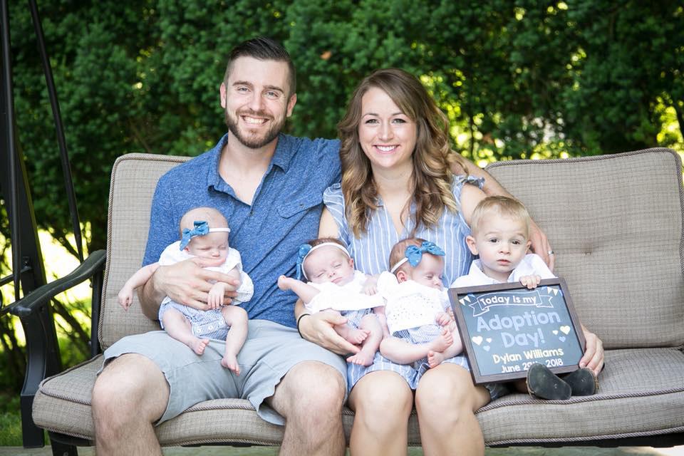  The family, with their triplet girls and adopted son, are delighted