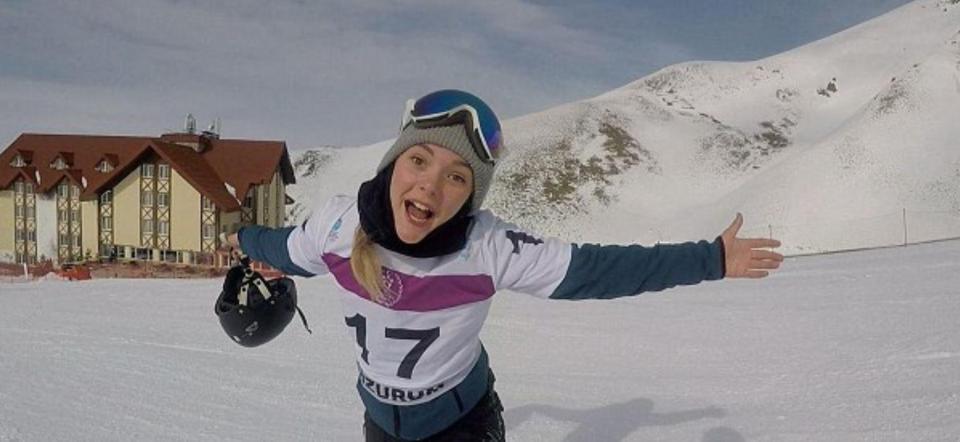  Ellie celebrates competing for British snowboarding. She was due to compete again next month