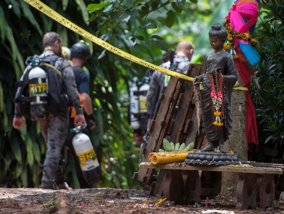 Divers prepare to take in supplies of oxygen