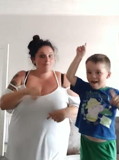  When the chorus hits, Alfie and Nichola sign in increasing synchronicity until the end when they both give a thumbs up as a huge grin spreads across his face