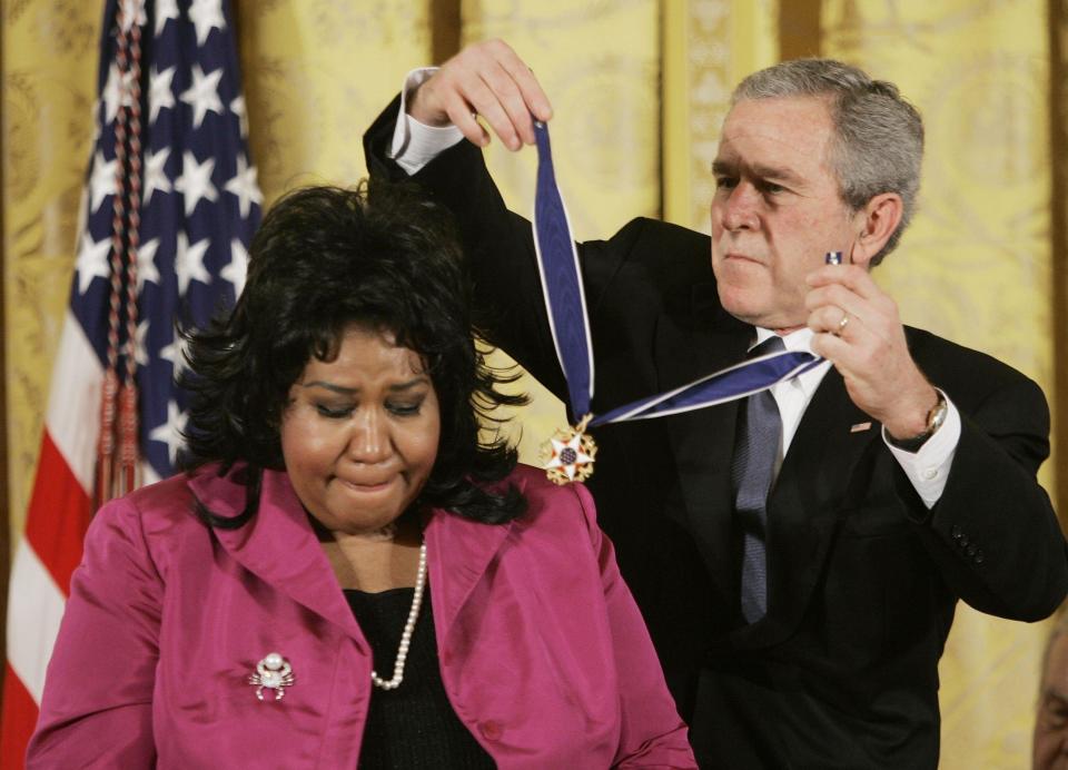  President Bush presents the Presidential Medal of Freedom to Aretha in 2005