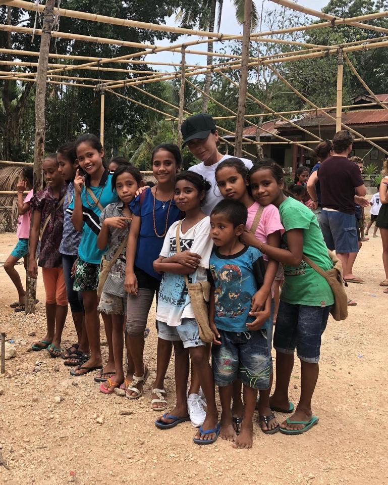  Victoria 'Posh Spice' Beckham posed with the children
