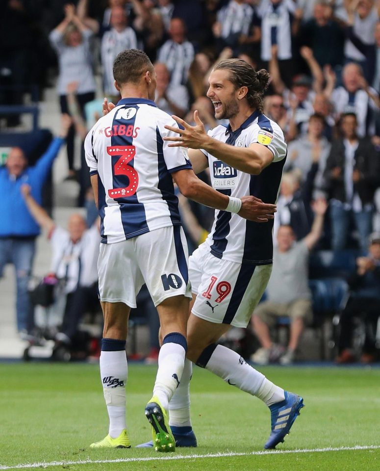 Kieran Gibbs celebrates his first ever goal for West Brom with two-goal frontman Jay Rodriguez 