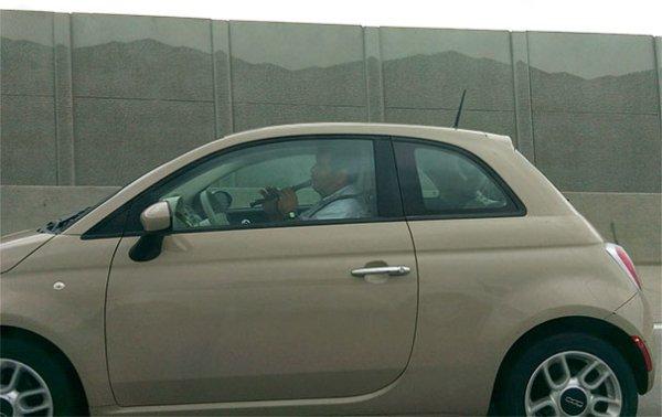  Is he trying to steer the car with music?