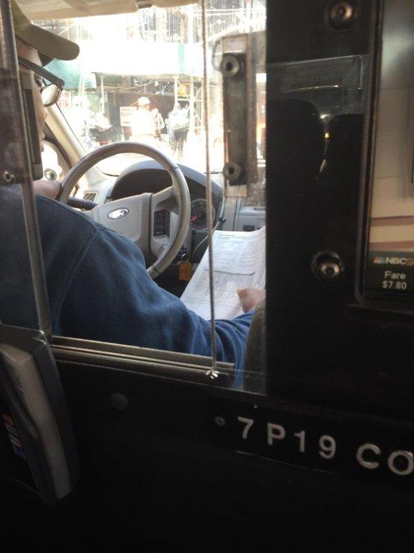  This taxi driver got caught out trying to multi-task while taking a fare