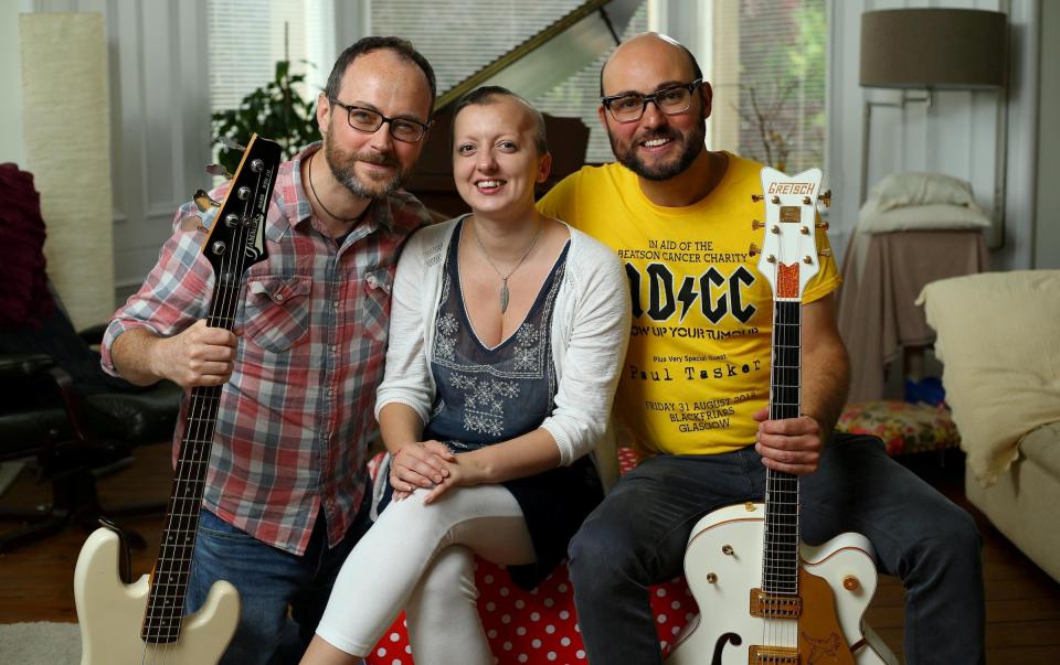  Sarah-May Philo pictured at home in Glasgow with fiance Paul Griffin, left and friend Rik Evans