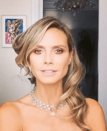  Her hair was styled into classic, Hollywood waves