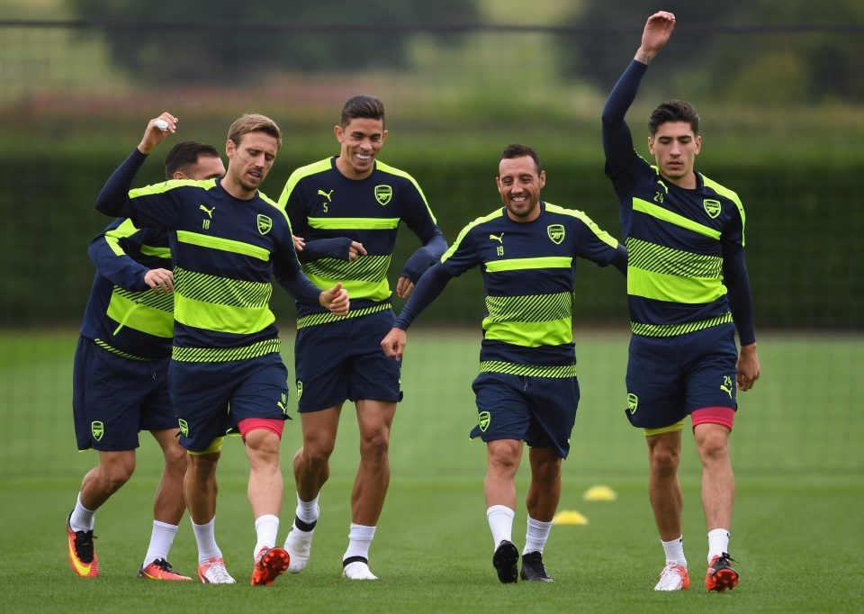  Lucas Perez, Nacho Monreal, Santi Cazorla, Hector Bellerin, and Gabriel warm up during an Arsenal training session