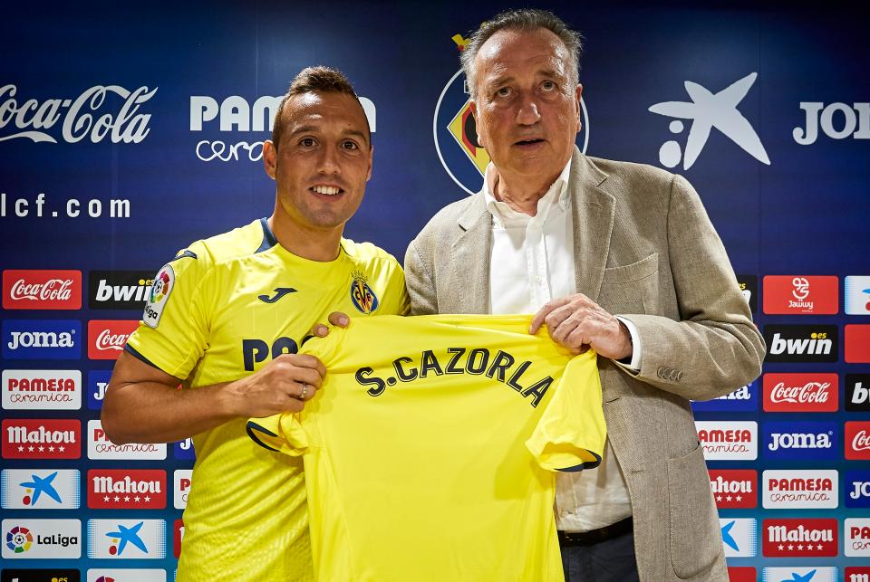  Santi Cazorla and President of Villarreal Fernando Roig pose during his official presentation as a new player of Villarreal