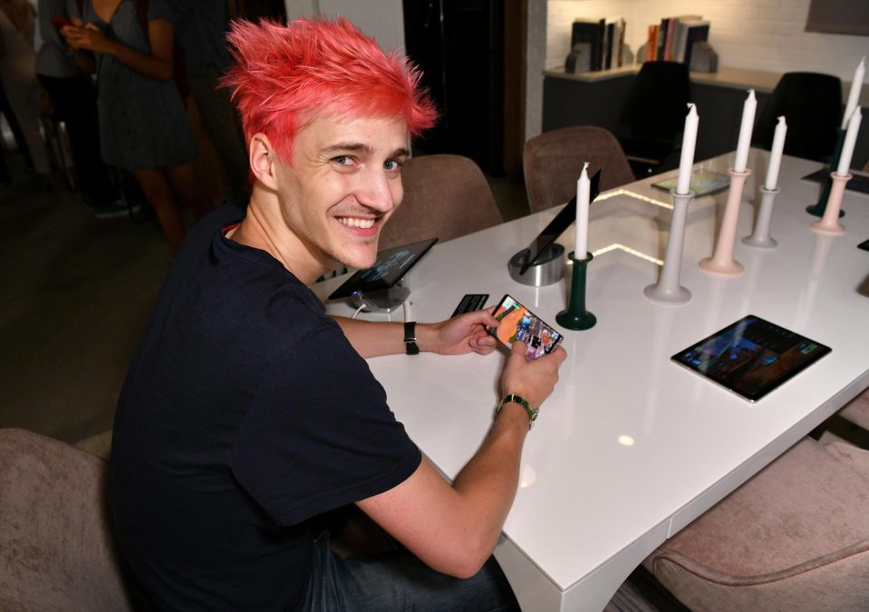  Ninja showing off Fortnite on a Samsung Galaxy handset after the launch