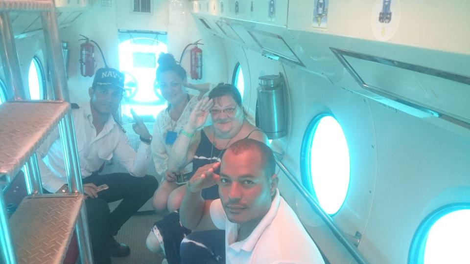  The 58-year-old from Bristol is pictured on a submarine trip earlier in the holiday