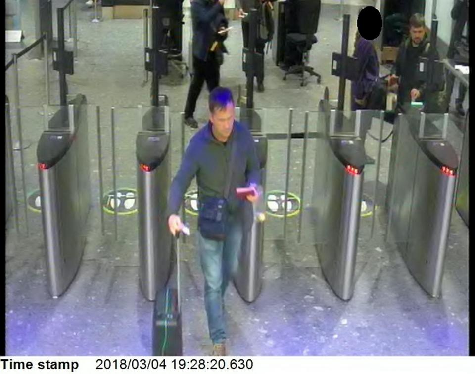 Both suspects are seen at Heathrow airport security at 19:28hrs on March 4