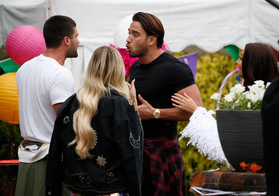The pair were seen in a heated argument at a cast garden party, while their girlfriends Amber Turner centre) and Yazmin Oukhellou R) watched in horror