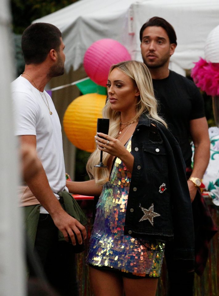 Amber, wearing a glitzy sequin dress, then appeared to tire of the drama and stormed off