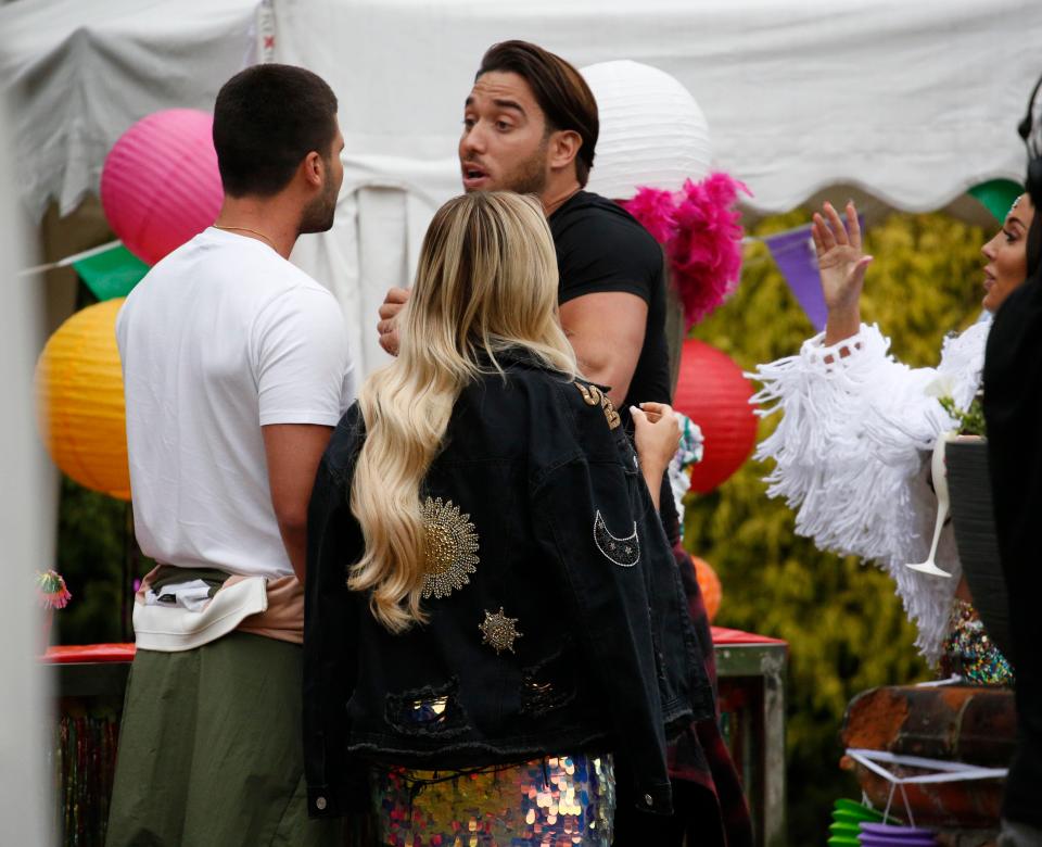 The pair were seen shouting and even squaring up to each other during the cast party