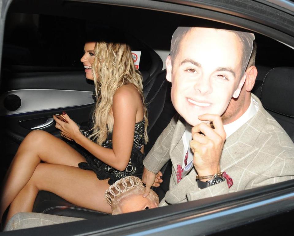  The DJ was seen holding up a mask with Ant McPartlin's face on