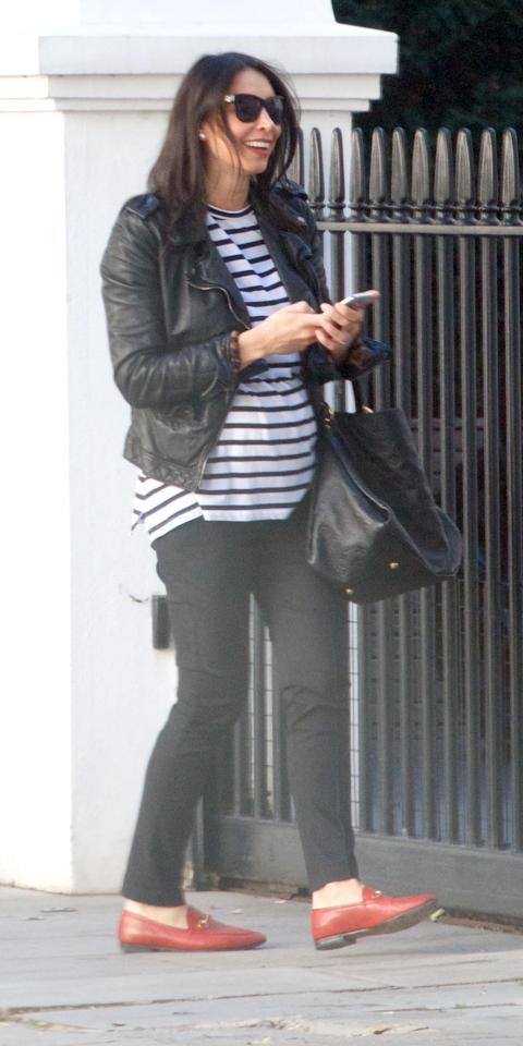  The telly star, 39, checked her phone