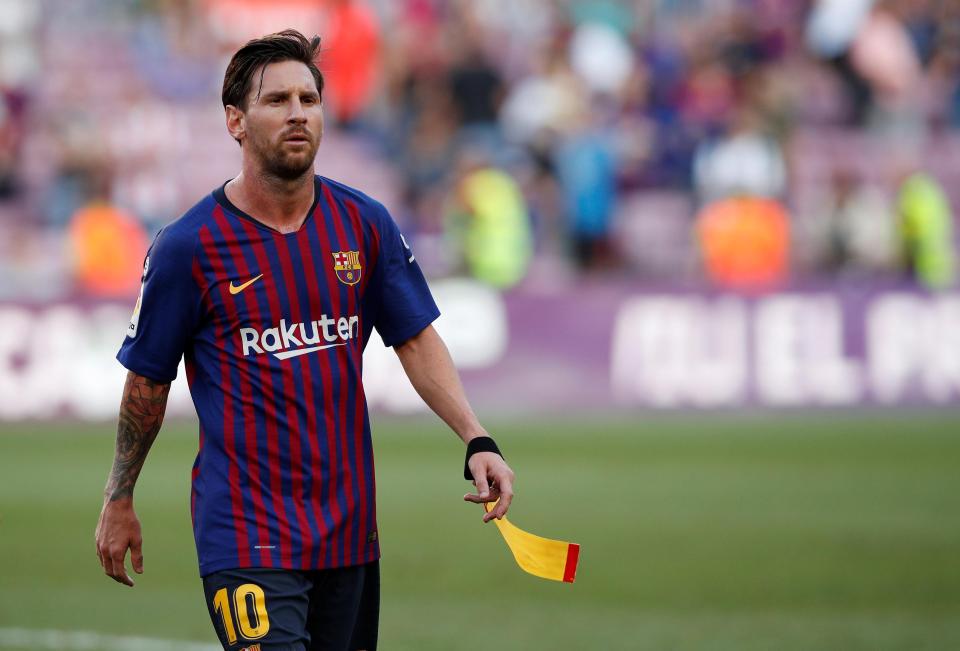  Lionel Messi did not look pleased after the draw