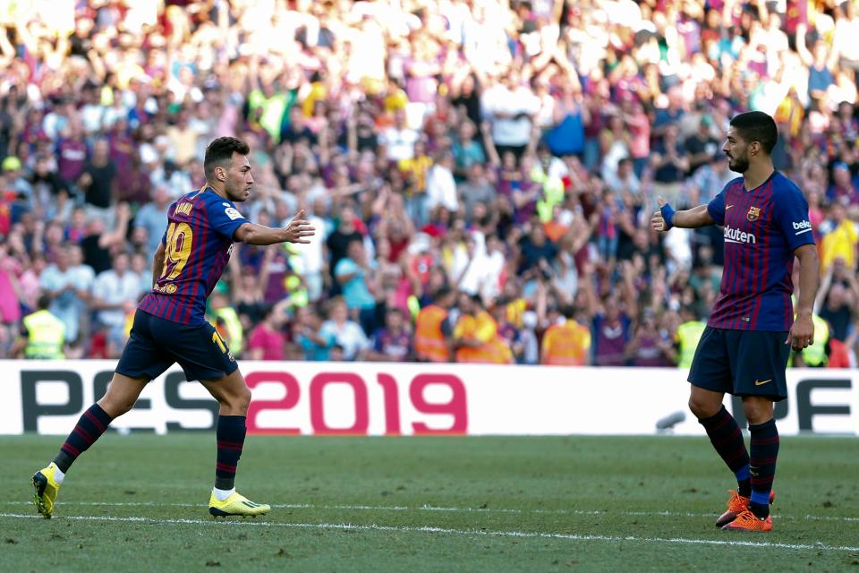  Munir celebrates with Luis Suarez after scoring a late equaliser