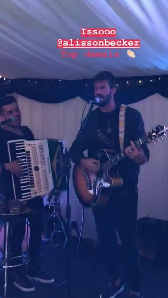 Liverpool keeper Alisson decided to entertain the crowd at his joint-birthday party with Roberto Firmino