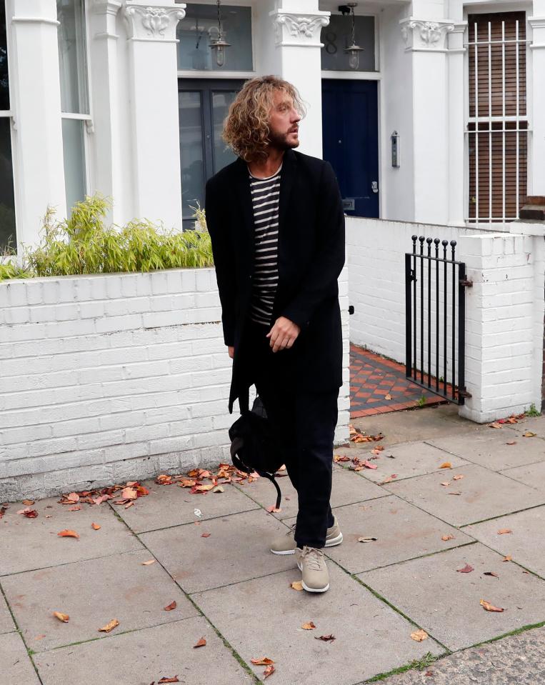  Seann also looked ashen-faced as he left his London home yesterday