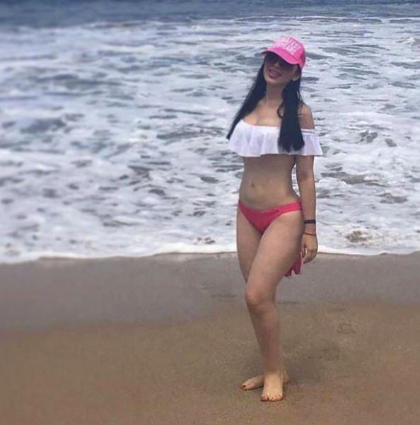  Bikini-clad Emma Coronel Aispuro poses on a beach for a social media snap