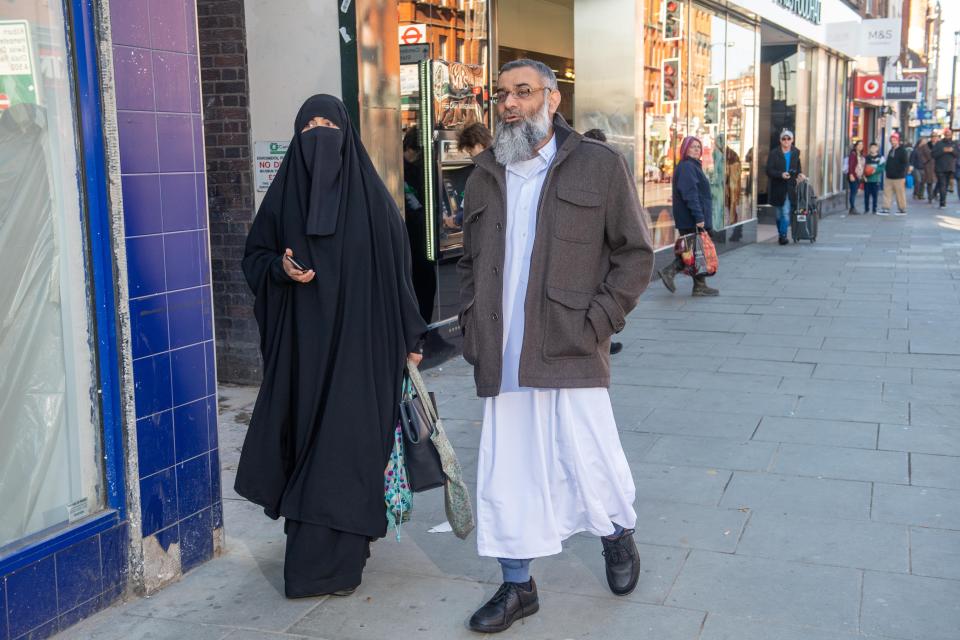  Smirking hate preacher Anjem Choudary today left his bail hostel to go to a solicitors