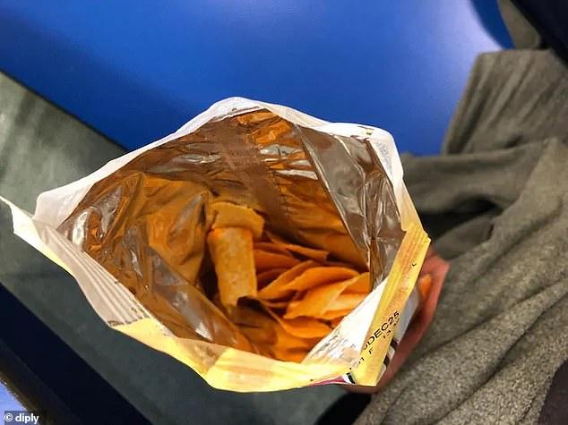  A hungry shopper looking forward to this snack found his bag of crisps half-empty