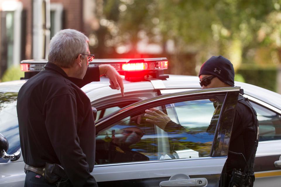 Secret Service officers were also seen talking outside the former president's residence in the capital