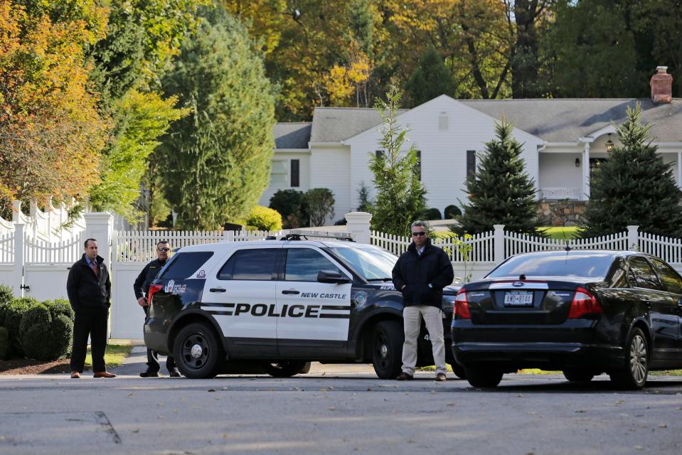 Several police vehicles were seen outside the Clinton home this morning following the discovery of the package