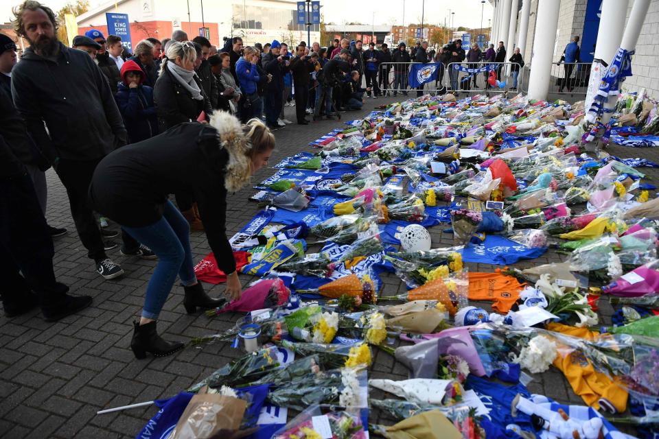  Dozens of flowers and Leicester City scarves have been left at King Power stadium