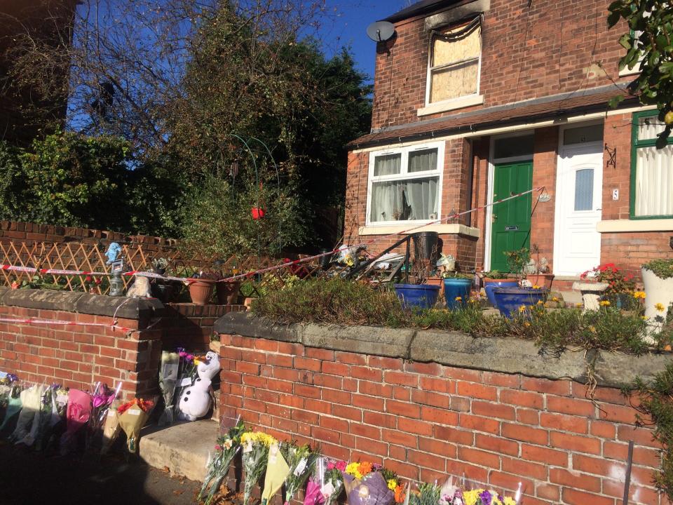  Touching tributes have been left at the property