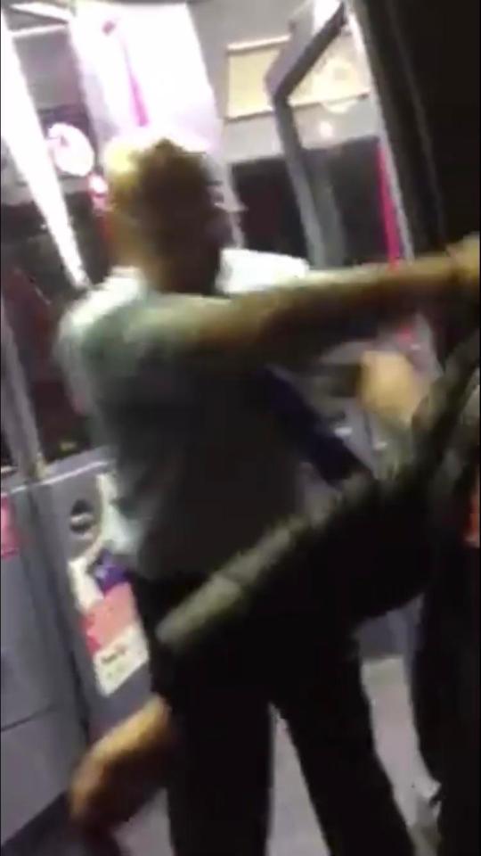  The man sends the boy flying, almost pushing him off his feet
