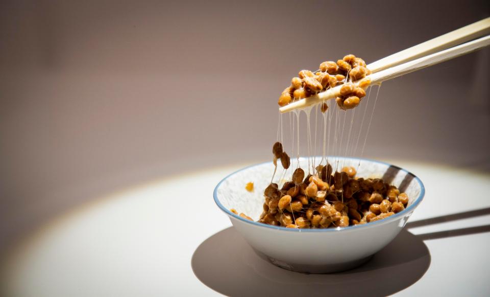 a bowl of Natto a traditional Japanese food made from soybeans fermented with Bacillus subtilis var