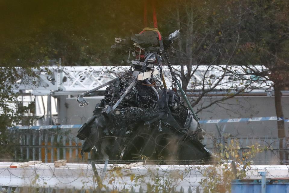  Part of the destroyed AgustaWestland AW169 helicopter was craned way