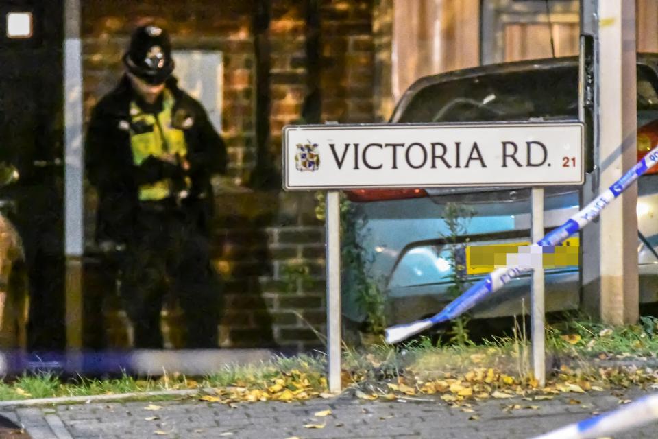  An officer stands on guard at the scene of the crime in Birmingham