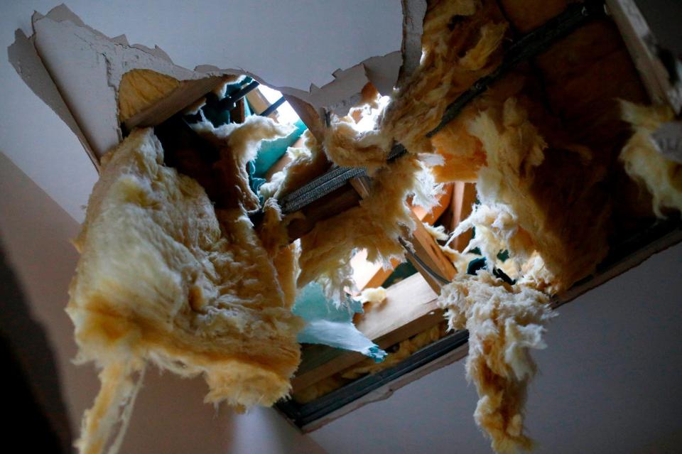  The block crashed through the ceiling and onto Jamie's bed