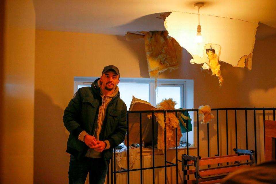  Jamie's mate Rob posing next to the broken ceiling